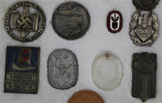 A collection of thirty two Hitler Youth pin badges and other day badges,